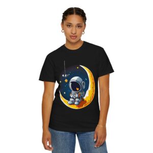 Woman wearing black garment-dyed unisex t-shirt with Astronaut on Moon design, front view