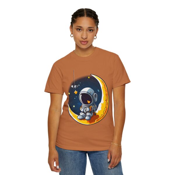 Woman wearing yam garment-dyed unisex t-shirt with Astronaut on Moon design, front view