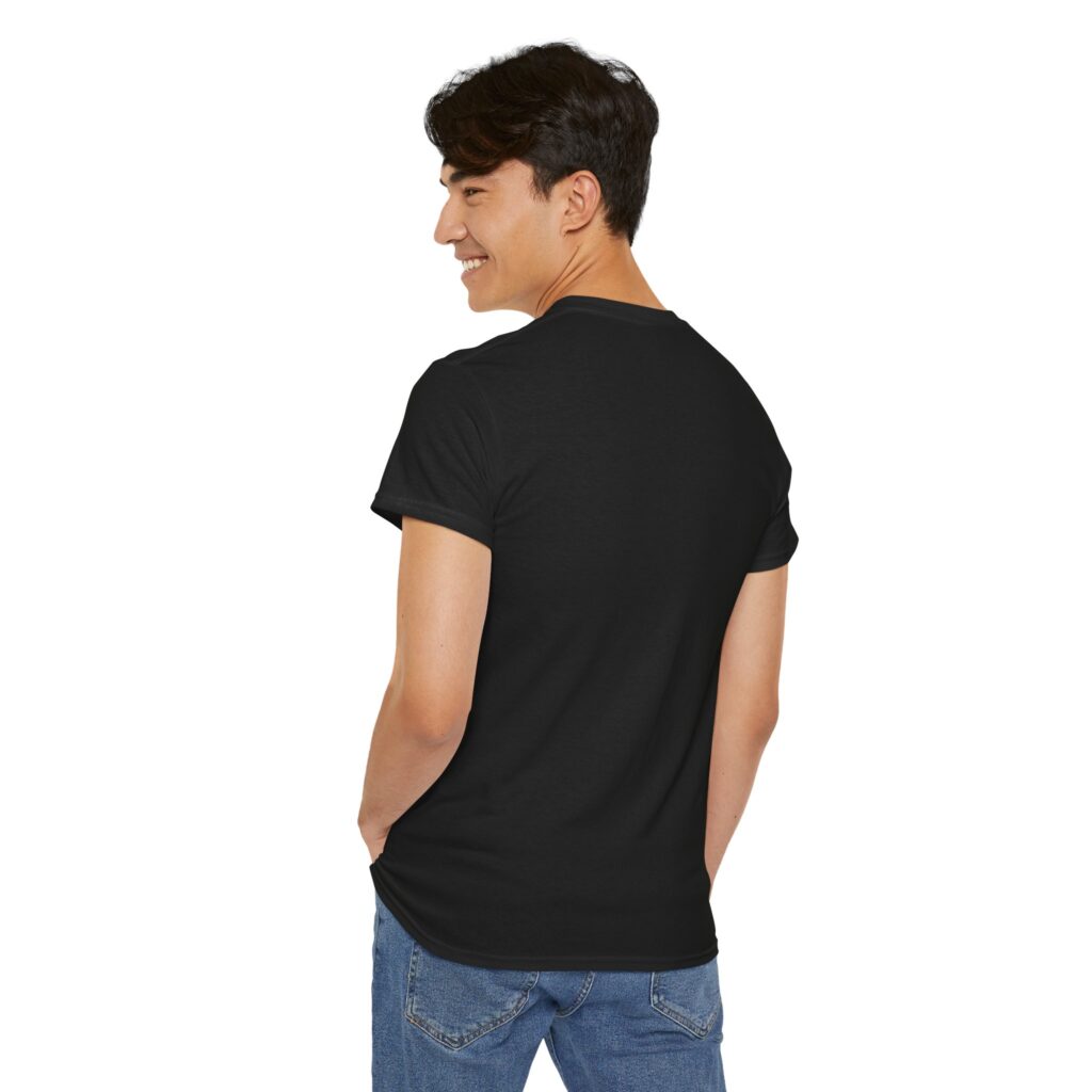 Black unisex heavy cotton t-shirt with "Attitude is Everything" design shown on a man (back view)