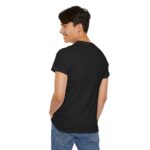 Black unisex heavy cotton t-shirt with "Attitude is Everything" design shown on a man (back view)