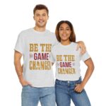 Ash unisex heavy cotton t-shirts with "Be The Game Changer" design shown on male and female duo