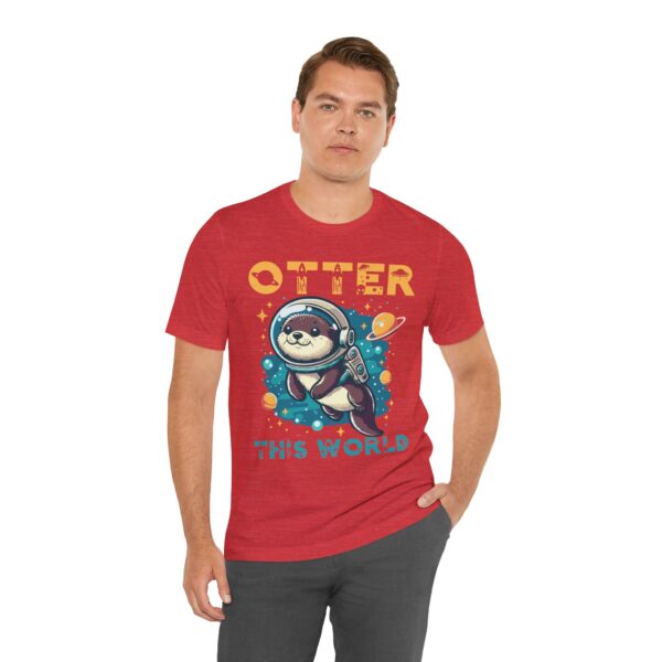 Man wearing heather red unisex jersey short sleeve tee with Cute Otter design, front view