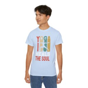 Man wearing light blue ultra cotton unisex tee with Yoga Heals the Soul design, front view