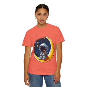 Woman Front view of bright salmon unisex garment-dyed t-shirt with "Astronaut On Moon" design - Aztren